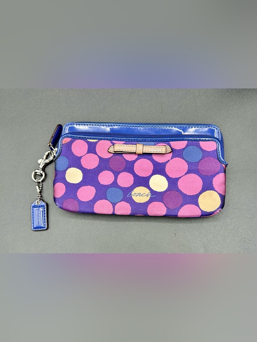 COACH Polka Dot Zippy Phone Wallet.